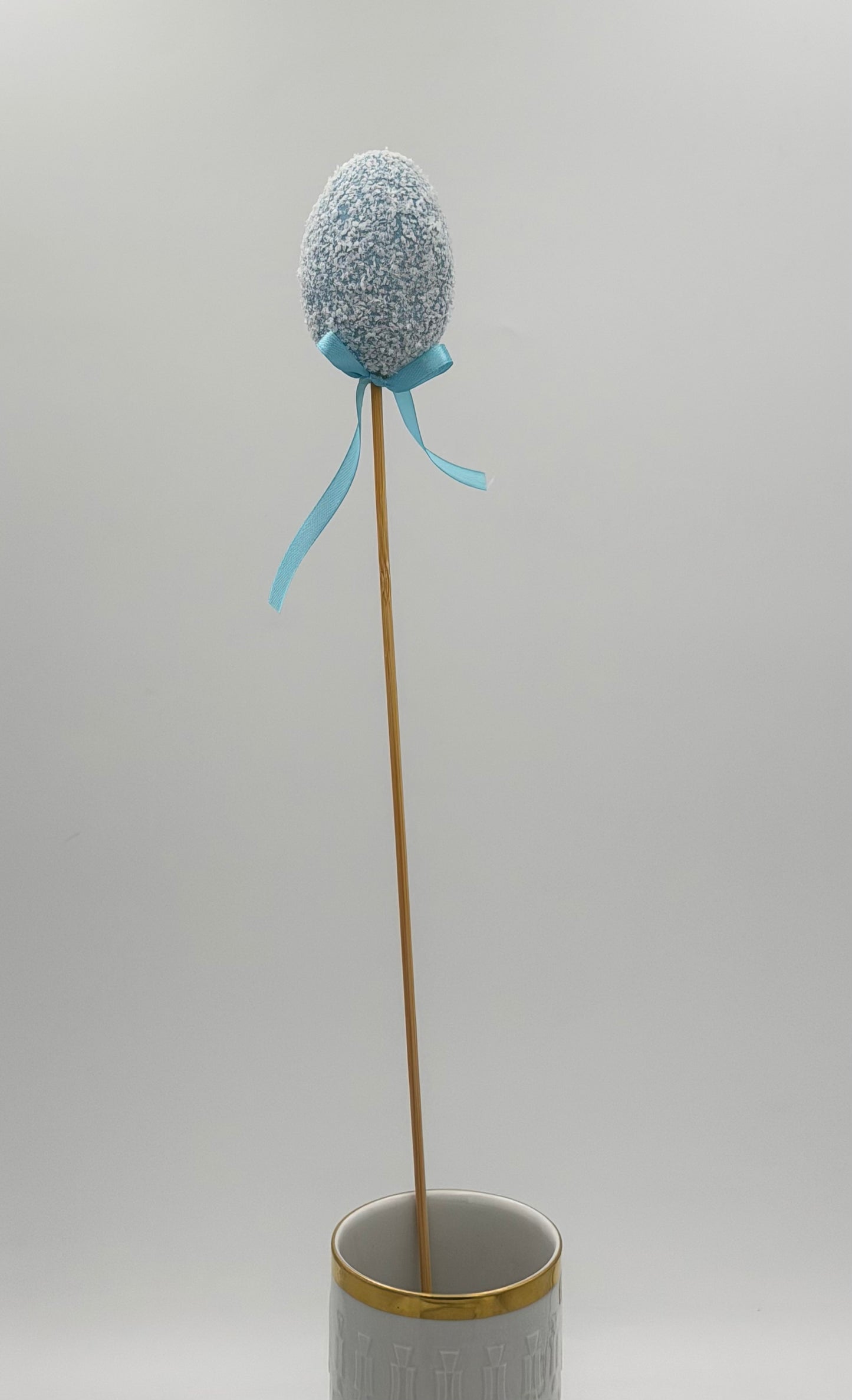 Dekostecker Osterei Candy mit Schleife hellblau 1 Stück