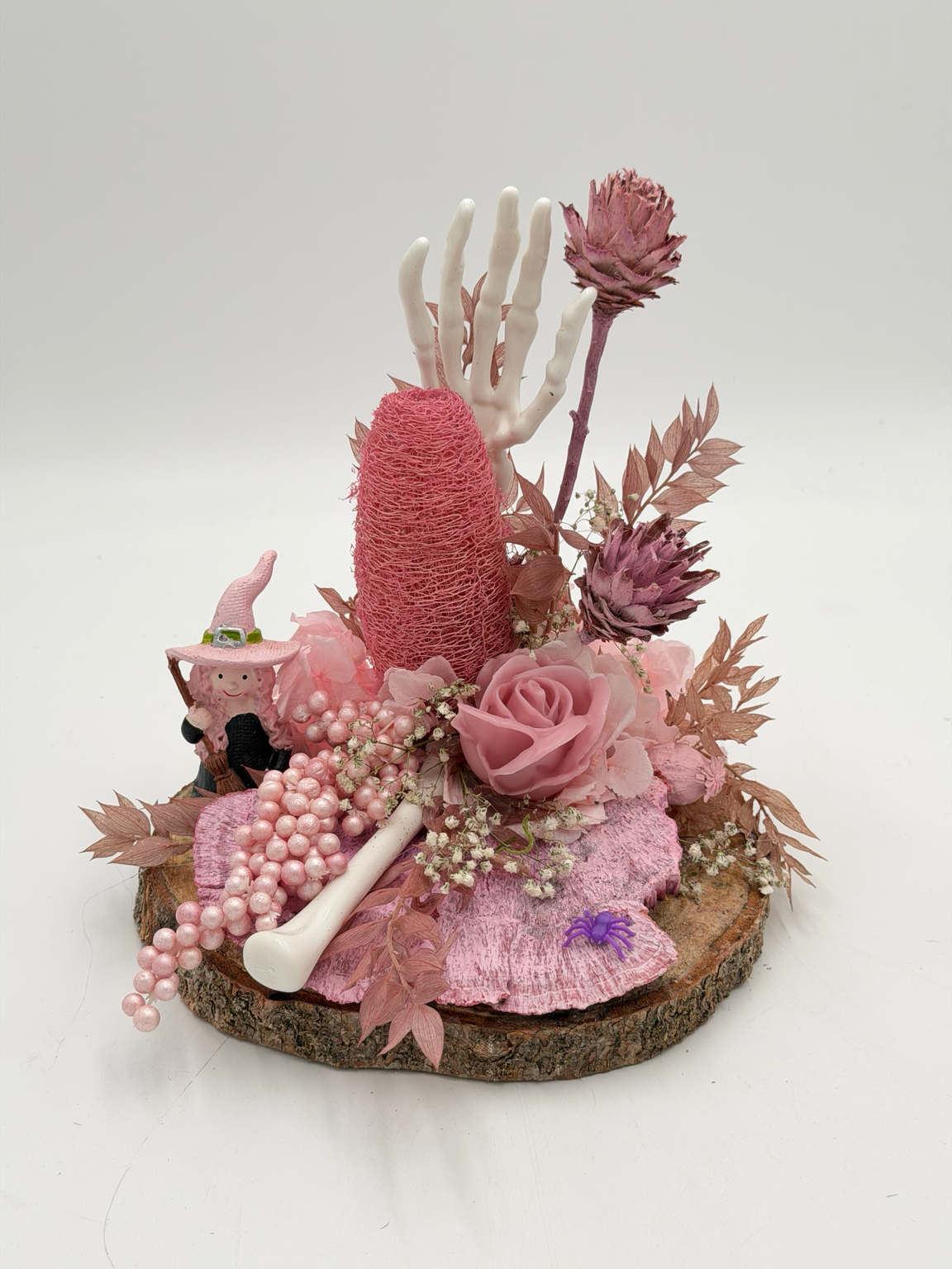 Halloween-Gesteck mit Hexe & Skeletthand Rosa/Pink ca. 23 cm Höhe